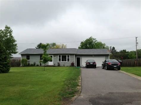 2 acres features an open layout, full of light, new floors throughout, split floorplan, spacious 25x25 ft patio, in-gound pool, lots of trees, a 12x12 steel outbuilding, and a detached 1200 sqft steel frame garage or workshop. . Houses for sale outside city limits
